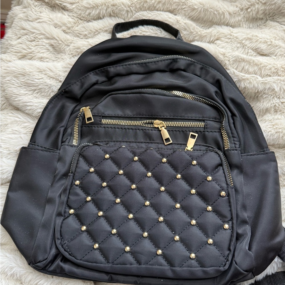 Black mini backpack with gold studs